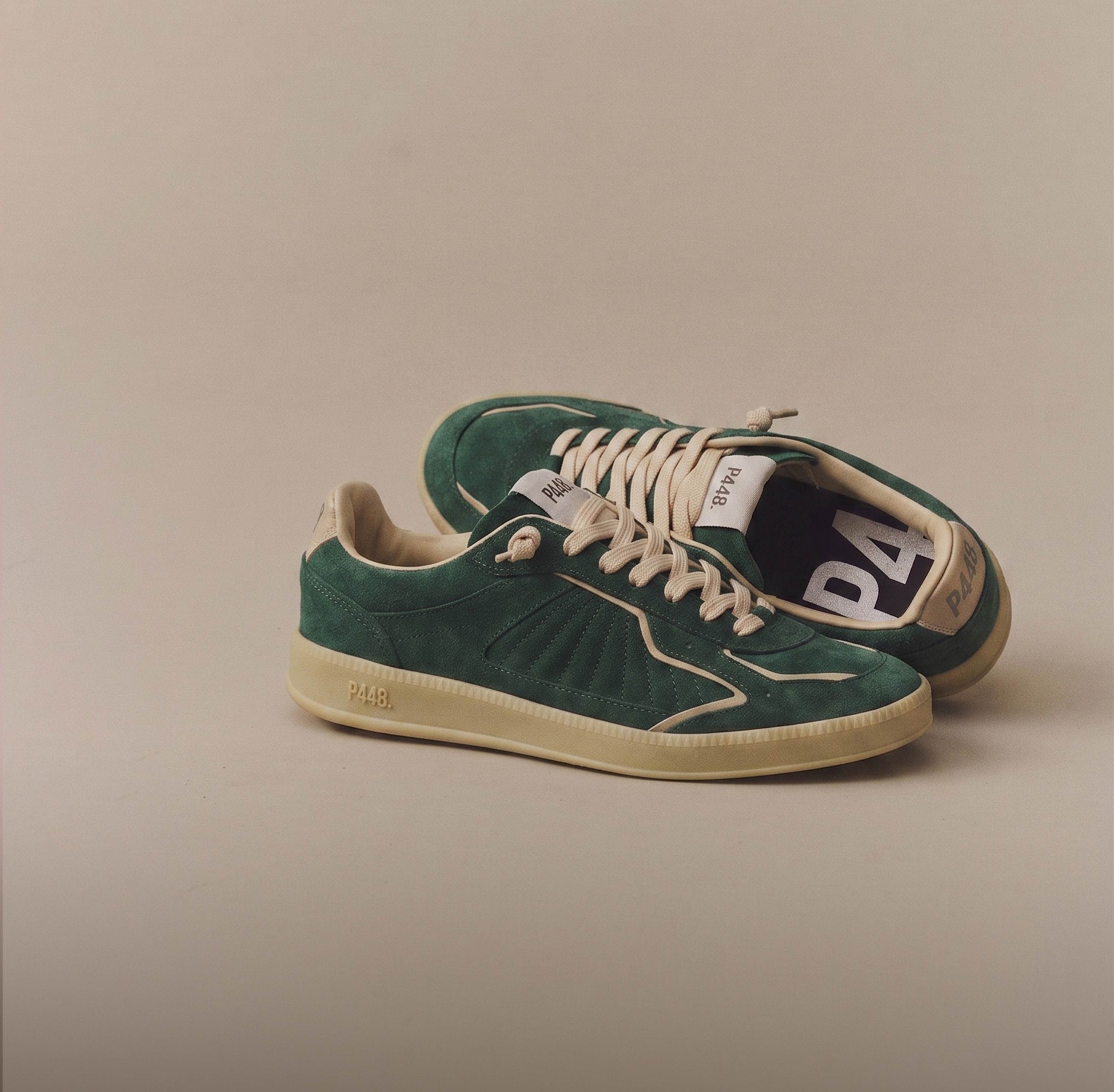 P448 men's sneaker in forest green suede with beige laces, cream piping, and a matching sole on a neutral background.