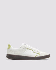 Side angle of green and white sneakers