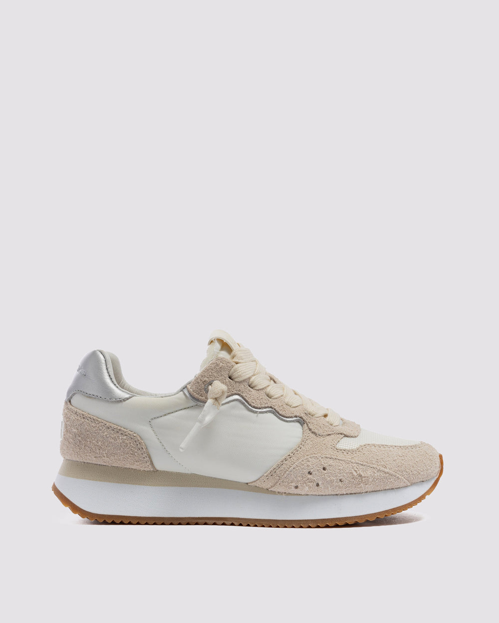 Side angle of light pink and white sneakers
