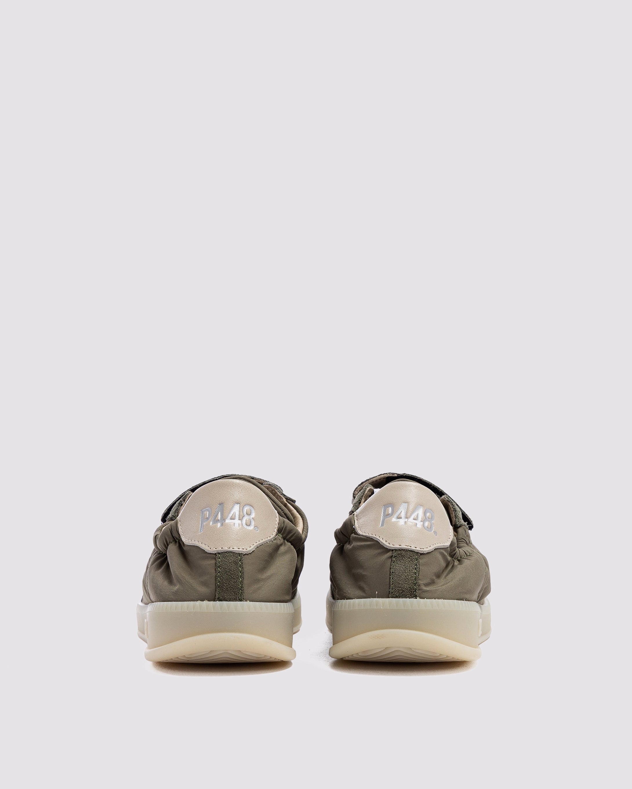 Side angle of nylon green sneakers
