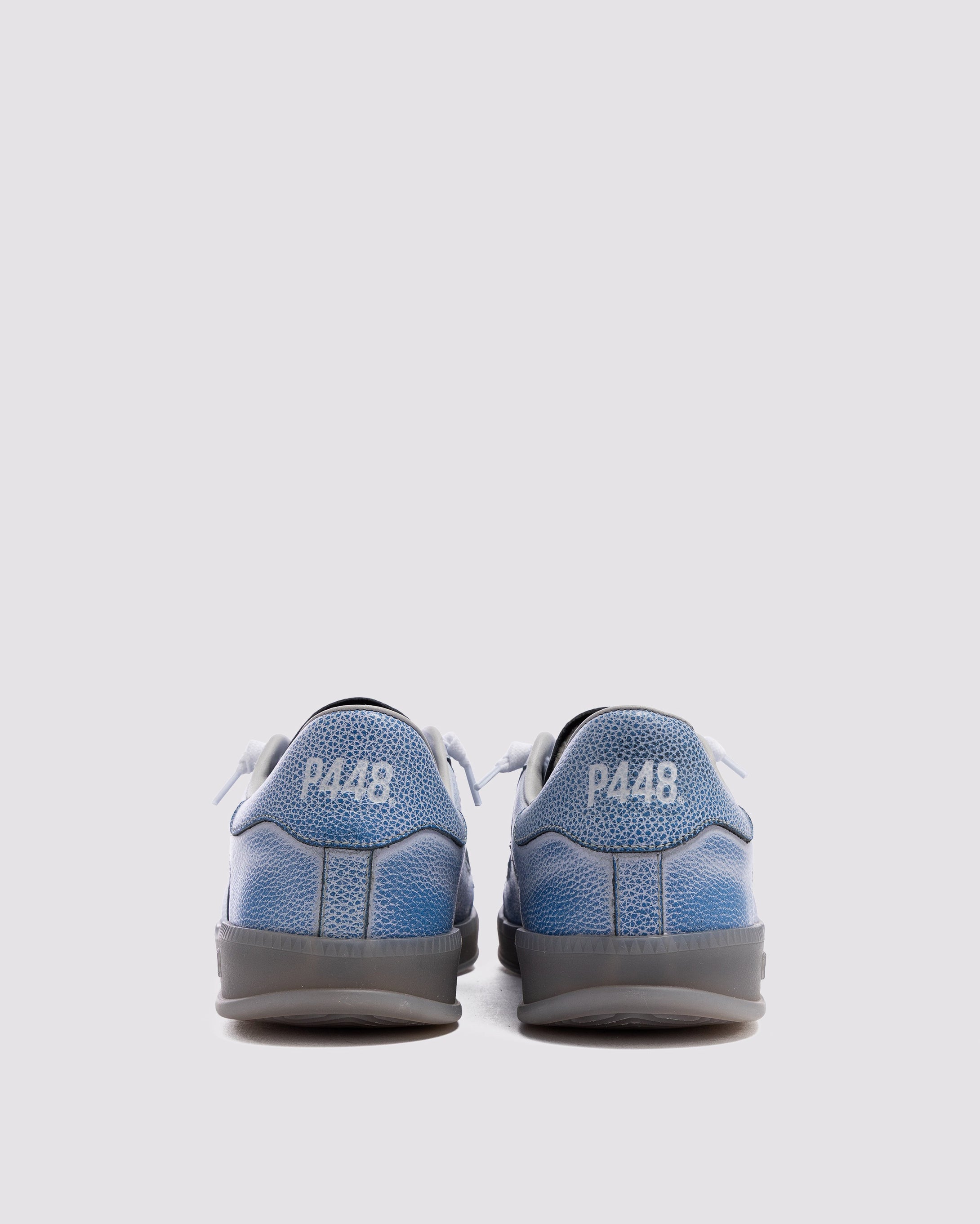 Side angle of blue sneakers