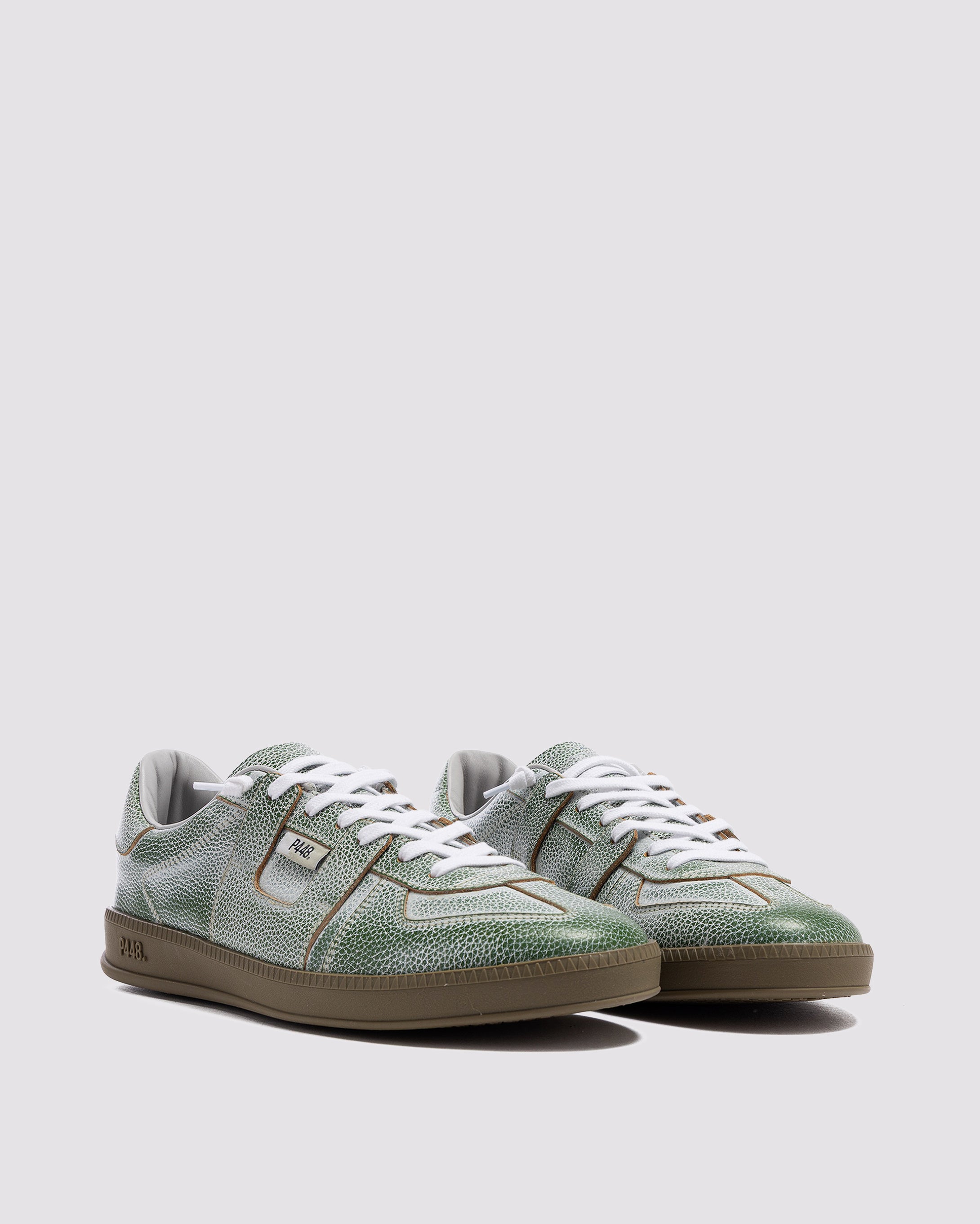 Side angle of green sneakers